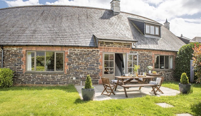 A stunning holiday home located in the Curved Stables at Roserrow. in Wadebridge