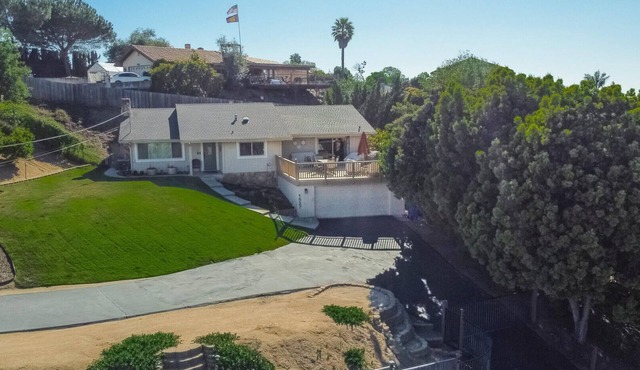 Cheerful Escape: Mountain Views, Fully Fenced, Game Room, Firepit, BBQ, & Office in Escondido