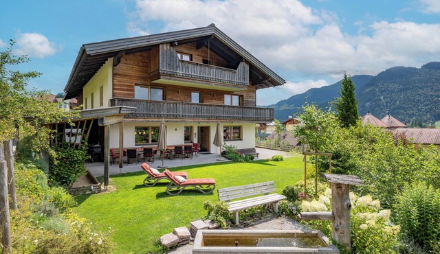 Holiday home Sonnhof am Walchsee in Tyrol, near the lake, lake view, garden, play area in Kössen