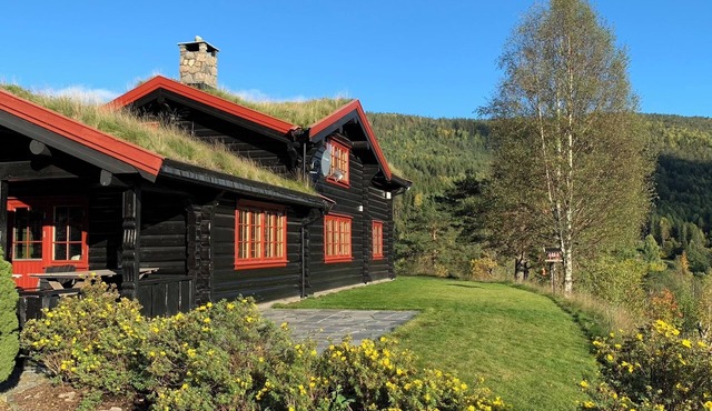 Luxury hillside family home with panoramic views, sauna & hot tub in Agder