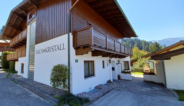 Spacious vacation apartment with fireplace + children's play corner, 10 + 2 persons in Scheffau am Wilden Kaiser